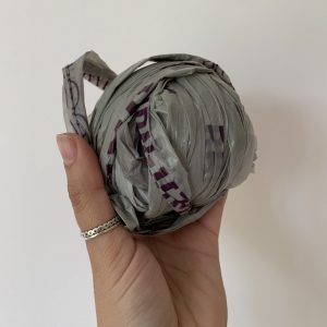 A ball of plarn made from cut up plastic carrier bags