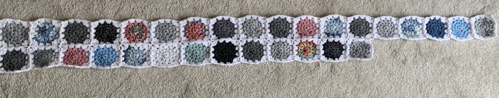 January in blanket form: a collection of granny squares inspired by the sky each day in January 