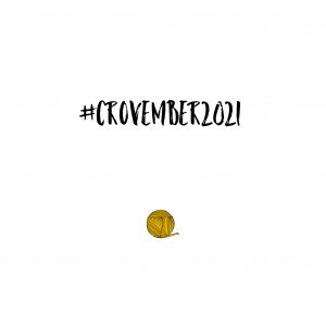 Crovember 2021 written over a yellow ball of yarn